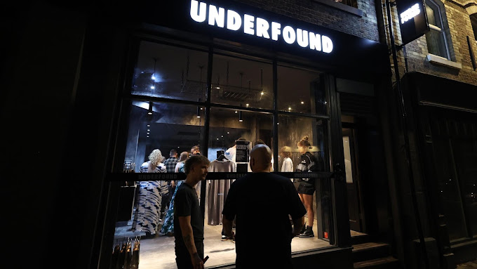 UNDERFOUND storefront at night